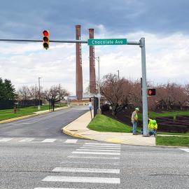 Bruce &amp; Merrilees union electricians install and test pedestrian signals along Chocolate Avenue in Hershey, PA