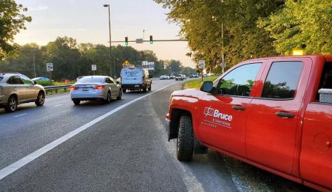 Bruce &amp; Merrilees truck observes traffic entering I-270 via metered ramp