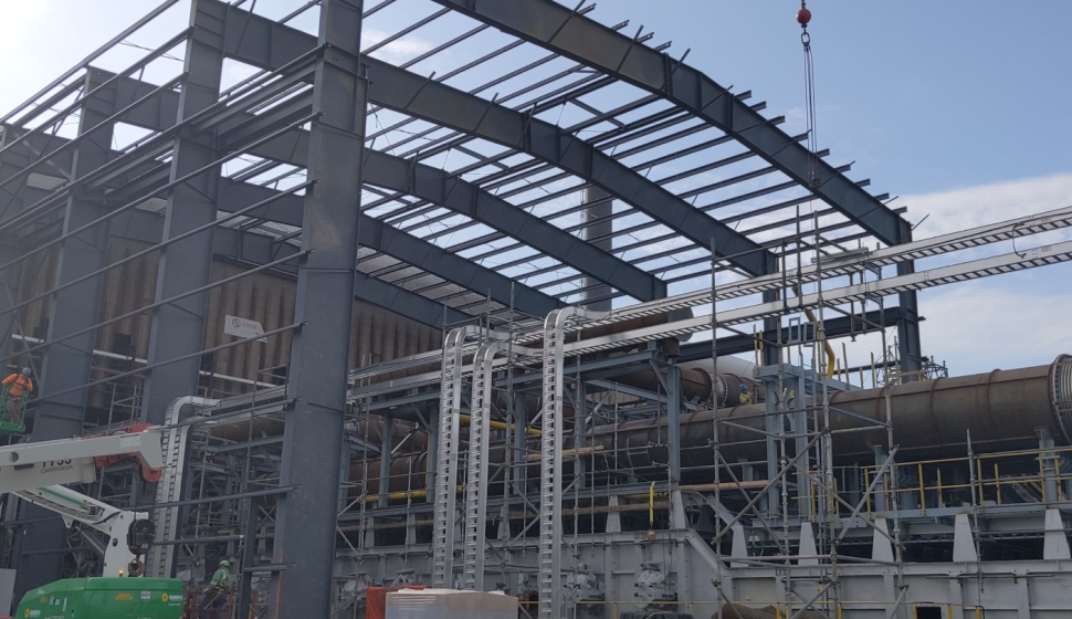 Steel skeleton erected around walking beam furnace